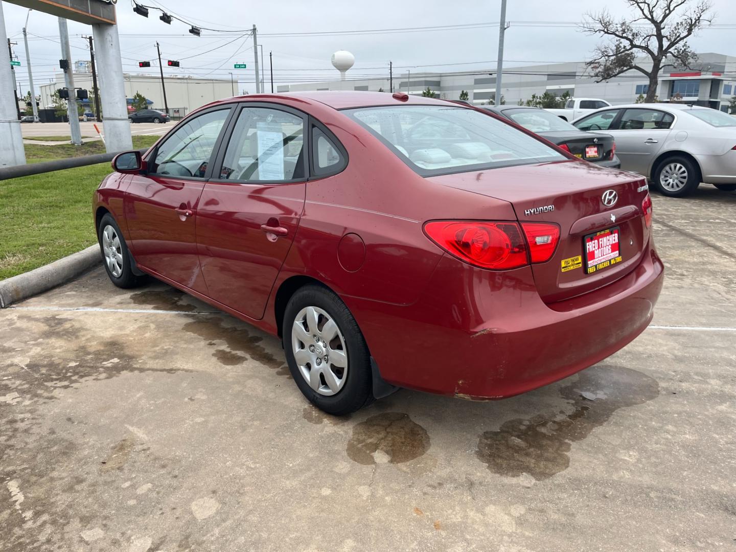 2008 red /TAN Hyundai Elantra GLS (KMHDU46D78U) with an 2.0L L4 DOHC 16V engine, Manual transmission, located at 14700 Tomball Parkway 249, Houston, TX, 77086, (281) 444-2200, 29.928619, -95.504074 - Photo#4